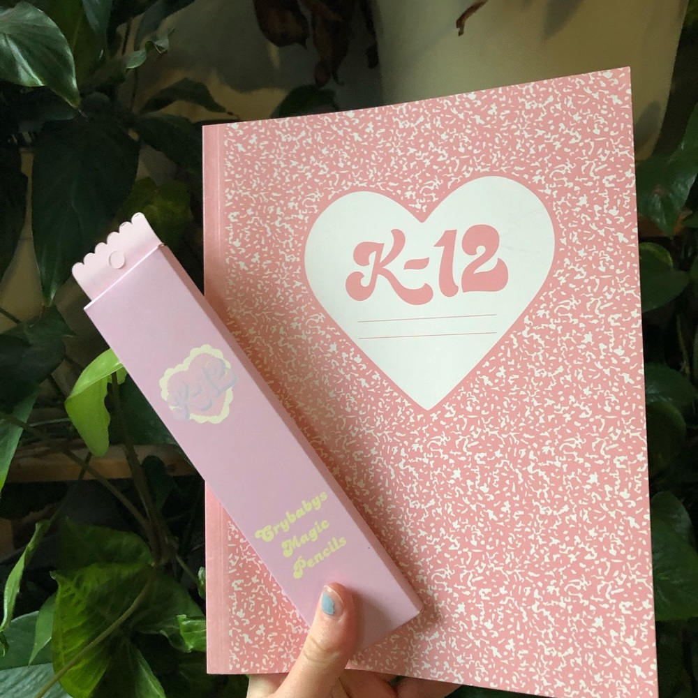 melanie martinez k12 notebook and coloring pencils